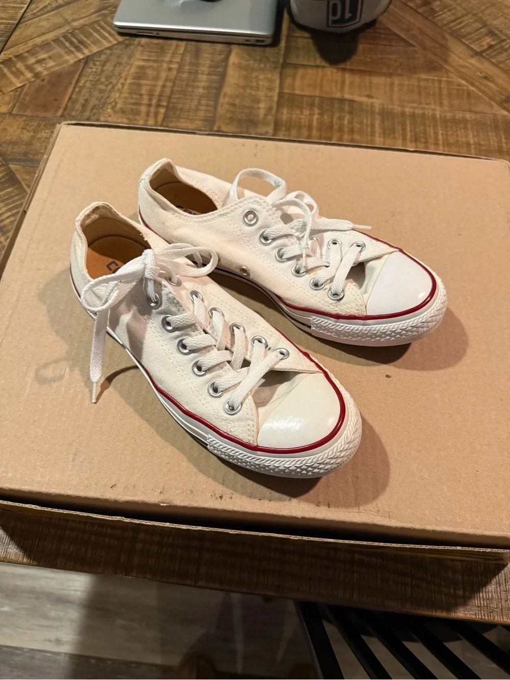 Converse Low Top Canvas Sneakers in White with Red Stripe